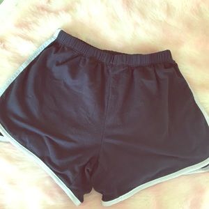 Cute navy blue shorts with white stripes on sides